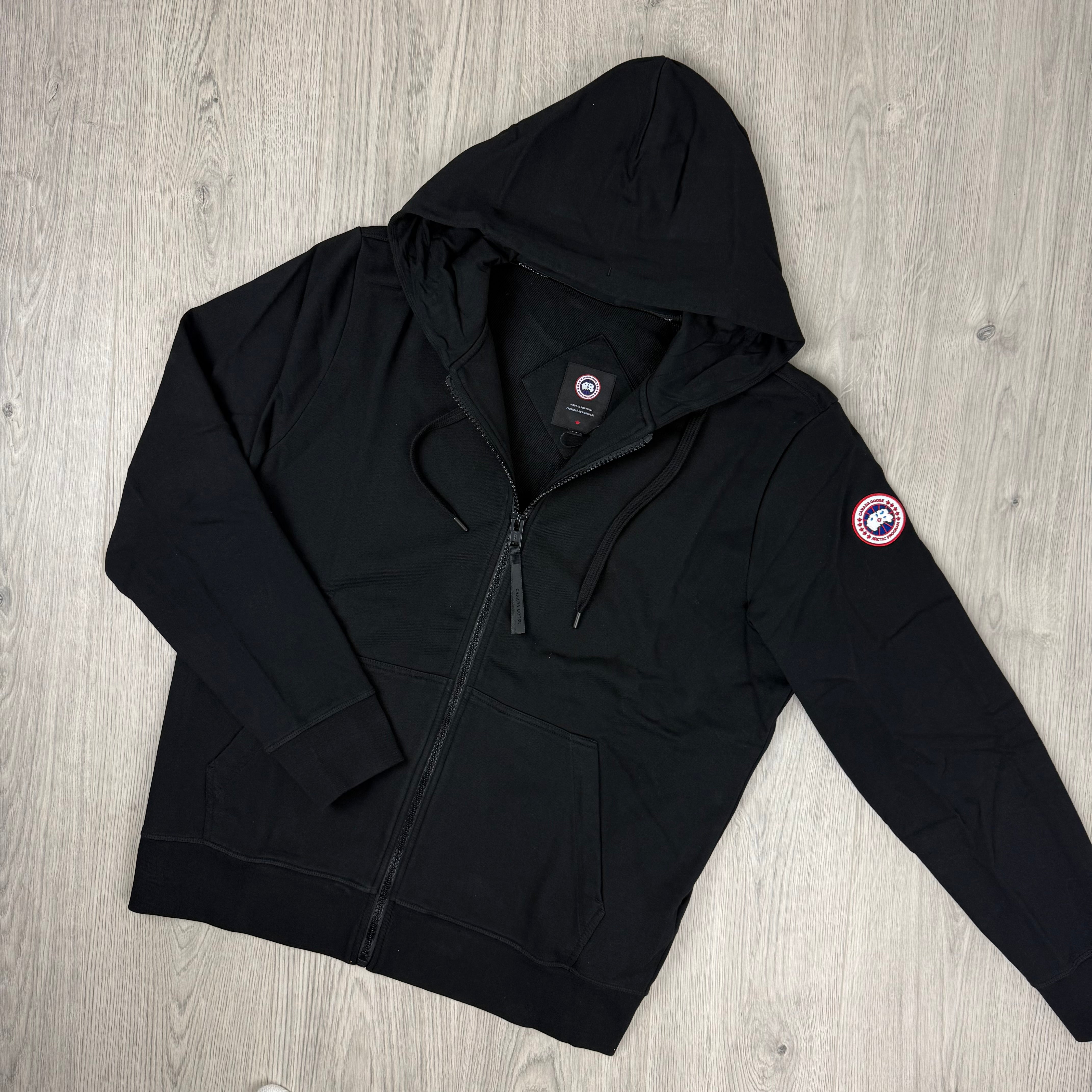 Men's Canada Goose Huron Zip Hoodie in Black. On sale at Open Attire.
