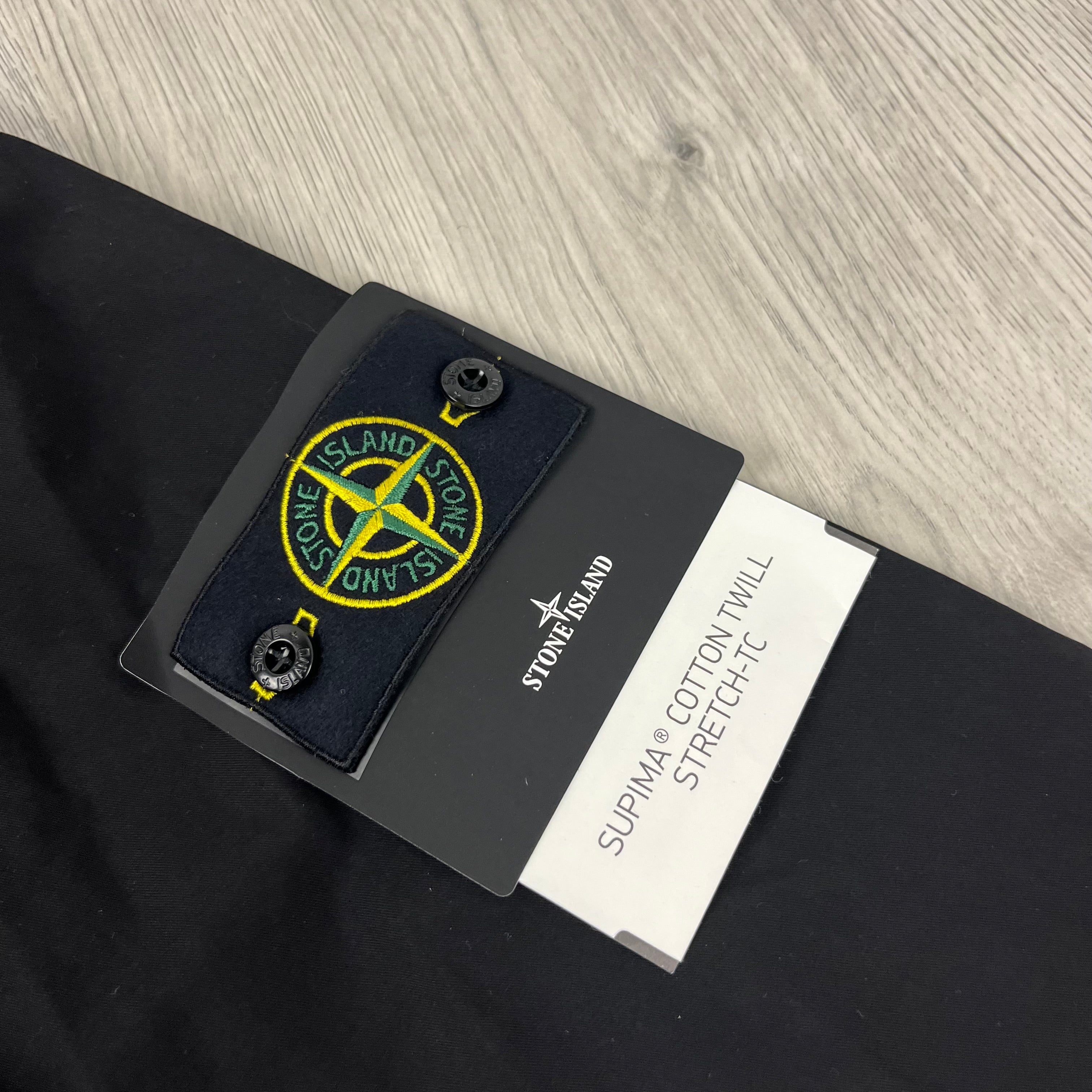 Men's Stone Island Supima Hooded Overshirt in Black. On sale at Open Attire.