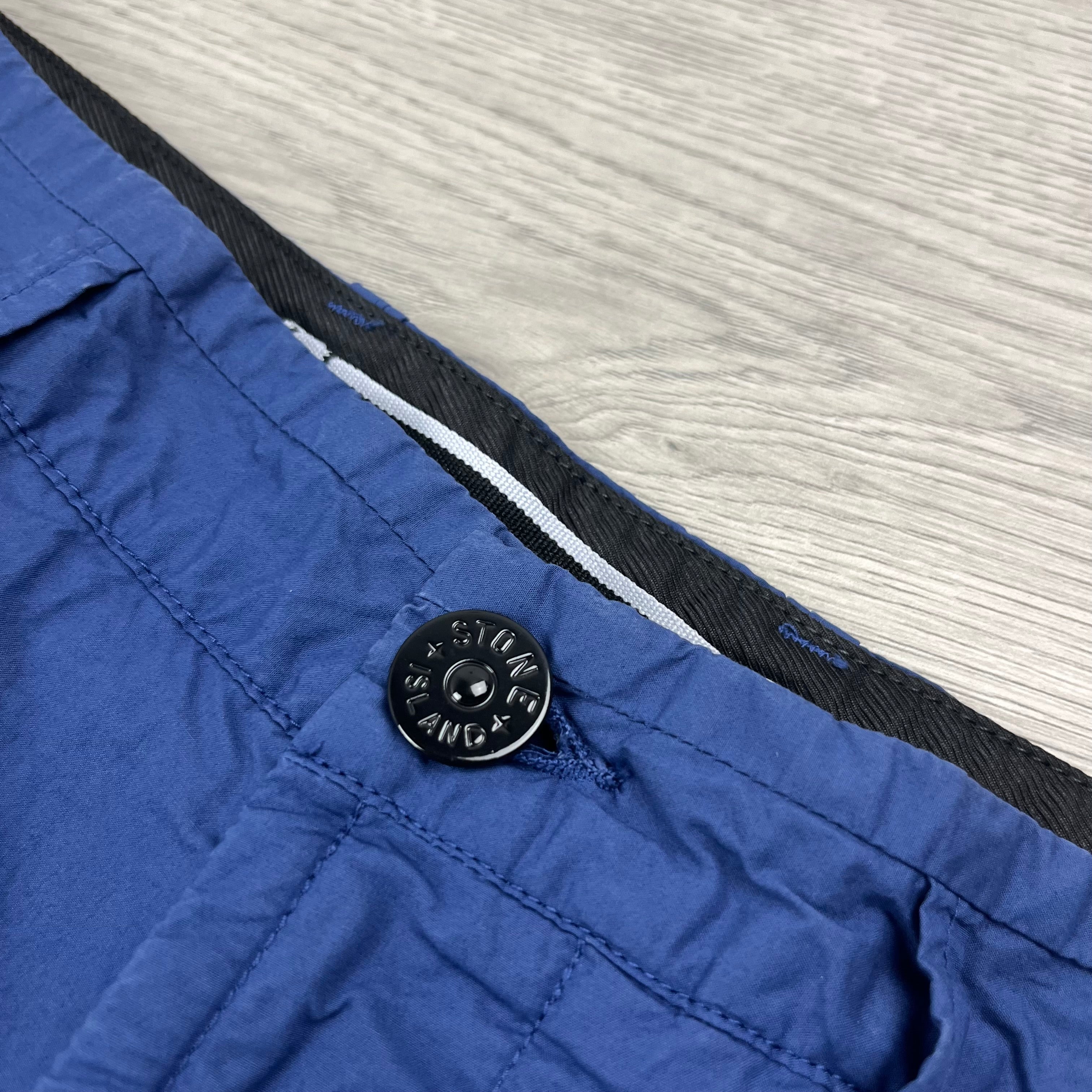 Stone Island Bermuda Cargo Shorts closure. On sale at Open Attire.