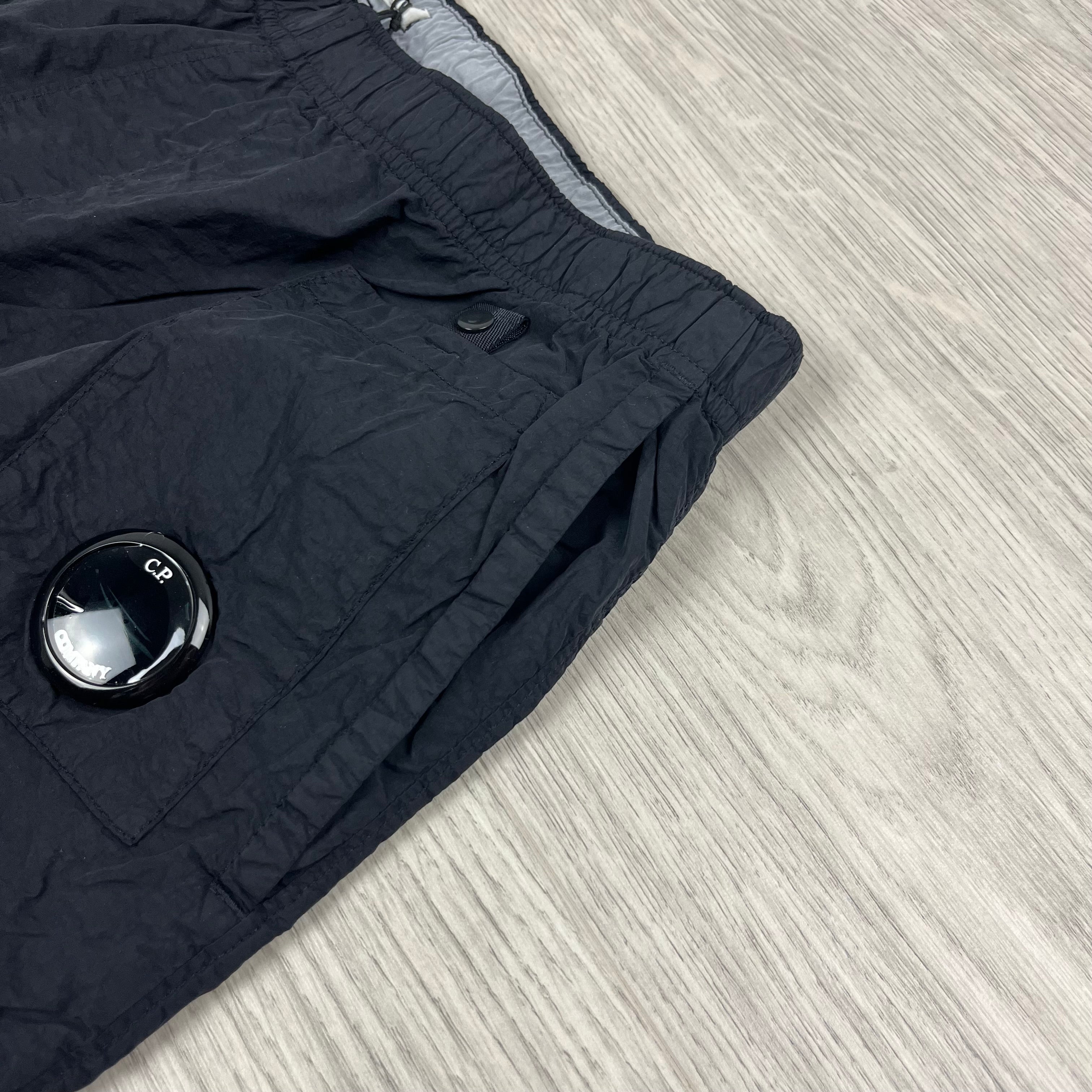 Men's CP Company Flatt Nylon Swim Shorts in Black. On sale at Open Attire.