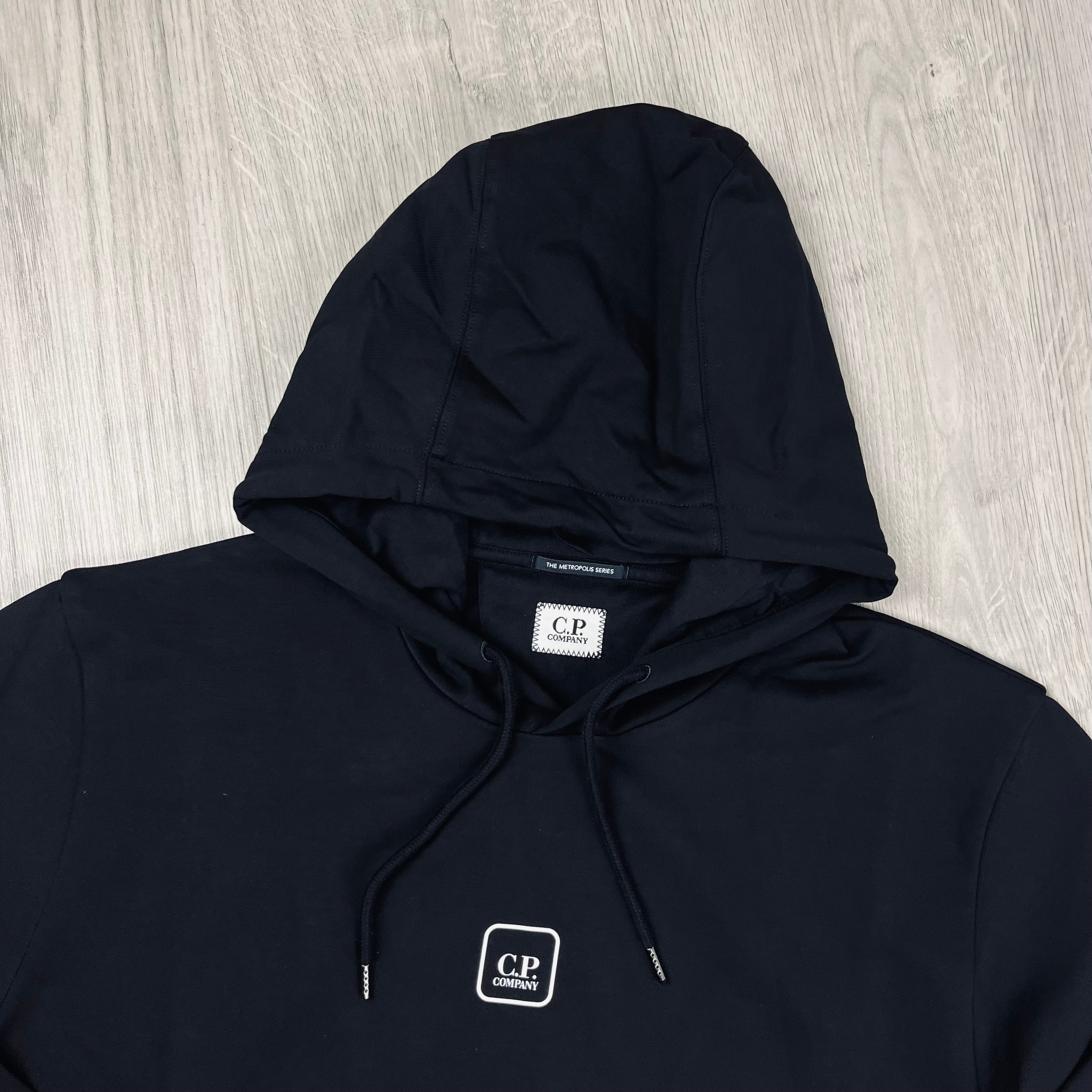 CP Company Metropolis Series Stretch Fleece Hoodie in Black. On sale at Open Attire.