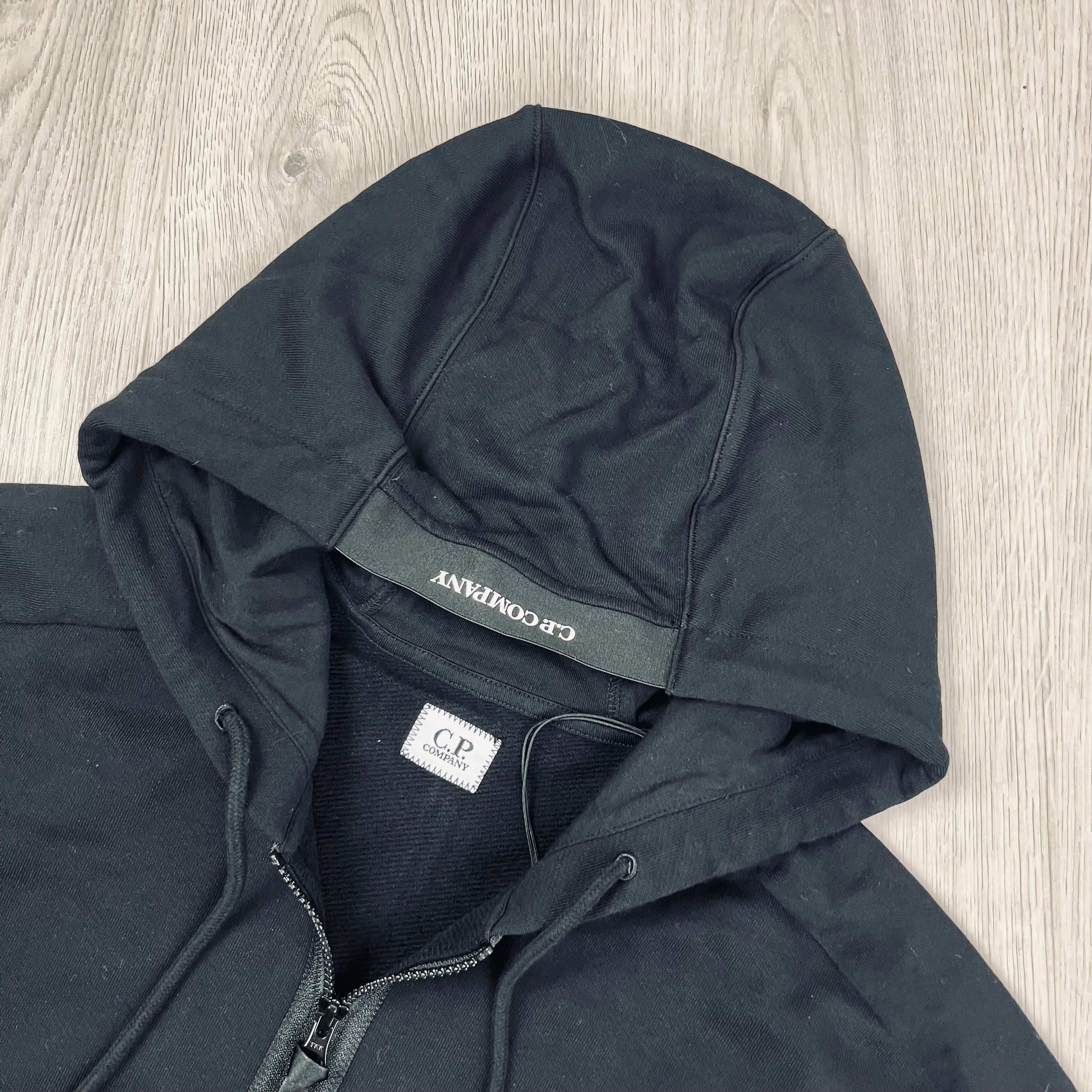 CP Company Diagonal Raised Fleece Zip Hoodie in Black. On Sale at Open Attire.