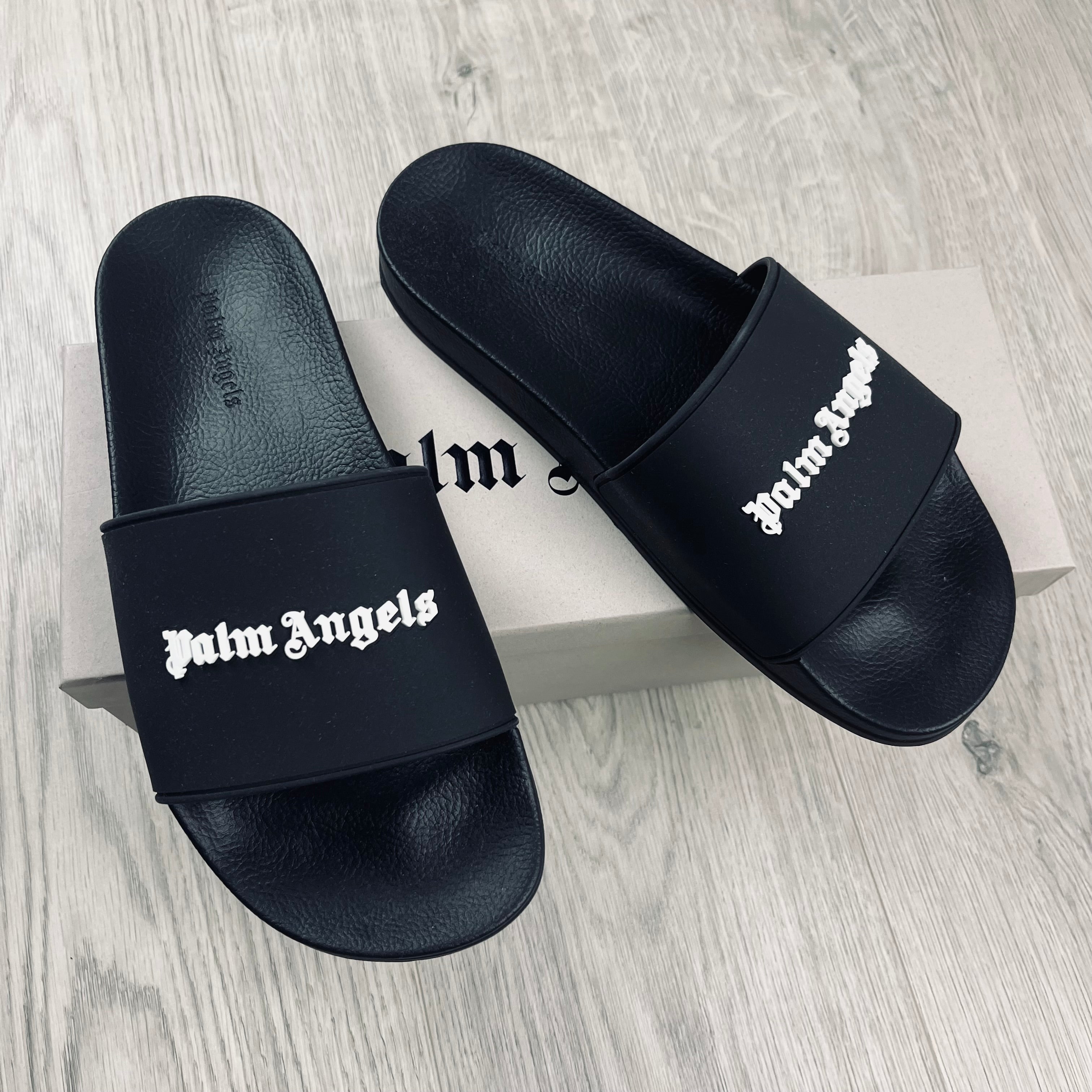 Palm Angels Rubber Slides in Black. On sale at Open Attire.