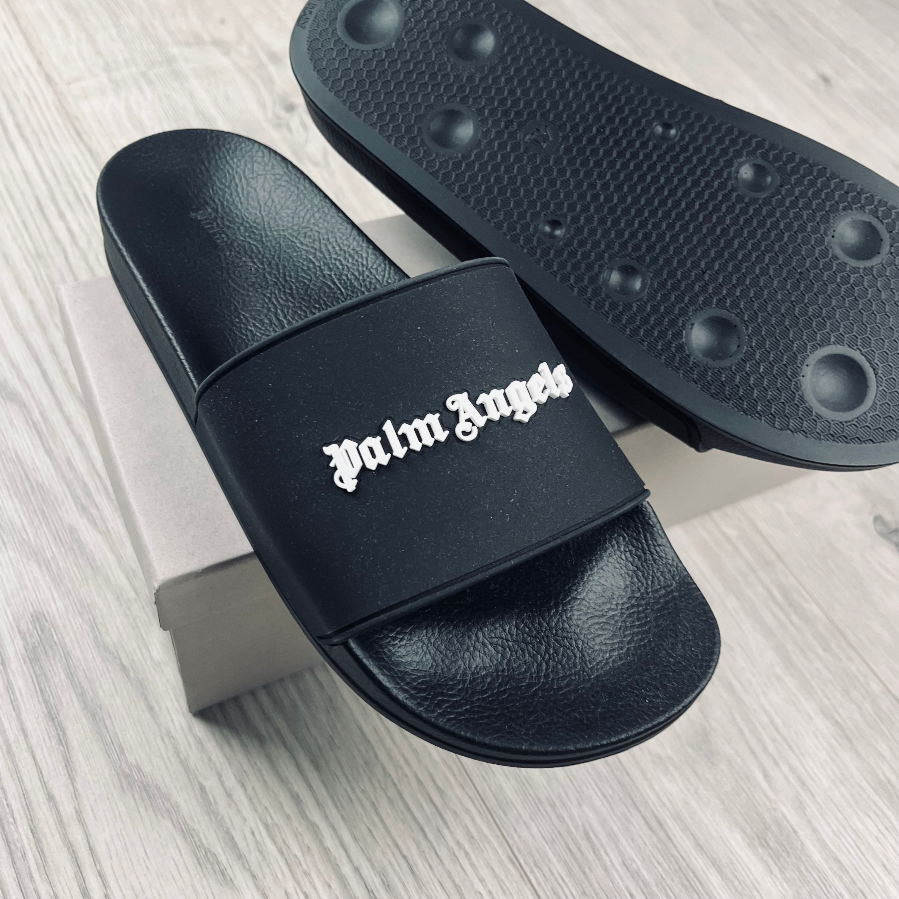 Palm Angels Rubber Slides in Black. On sale at Open Attire.