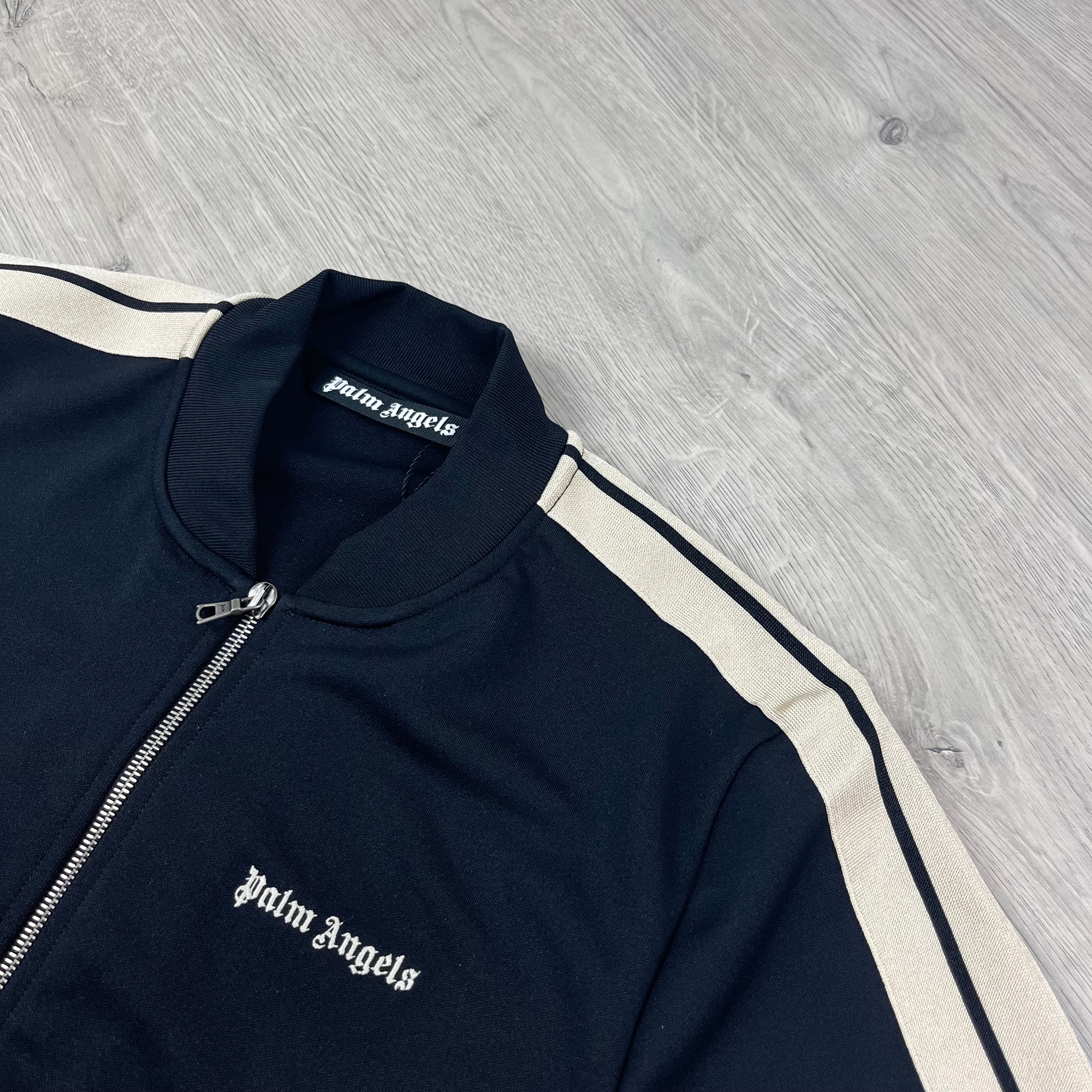 Palm Angels Embroidered Track Jacket in Black. On sale at Open Attire.