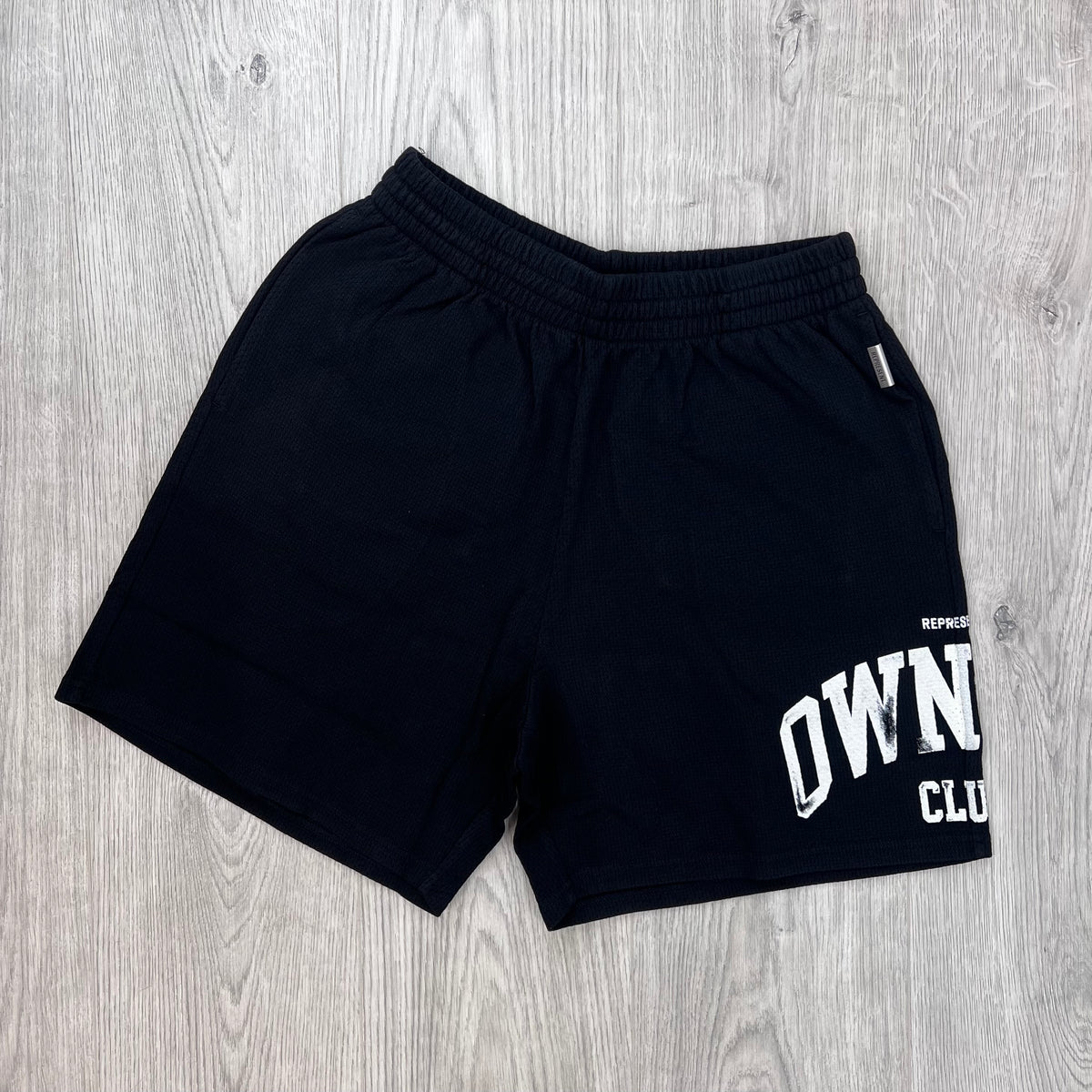 Front view of Represent Owners Club Mesh Shorts in Black.
