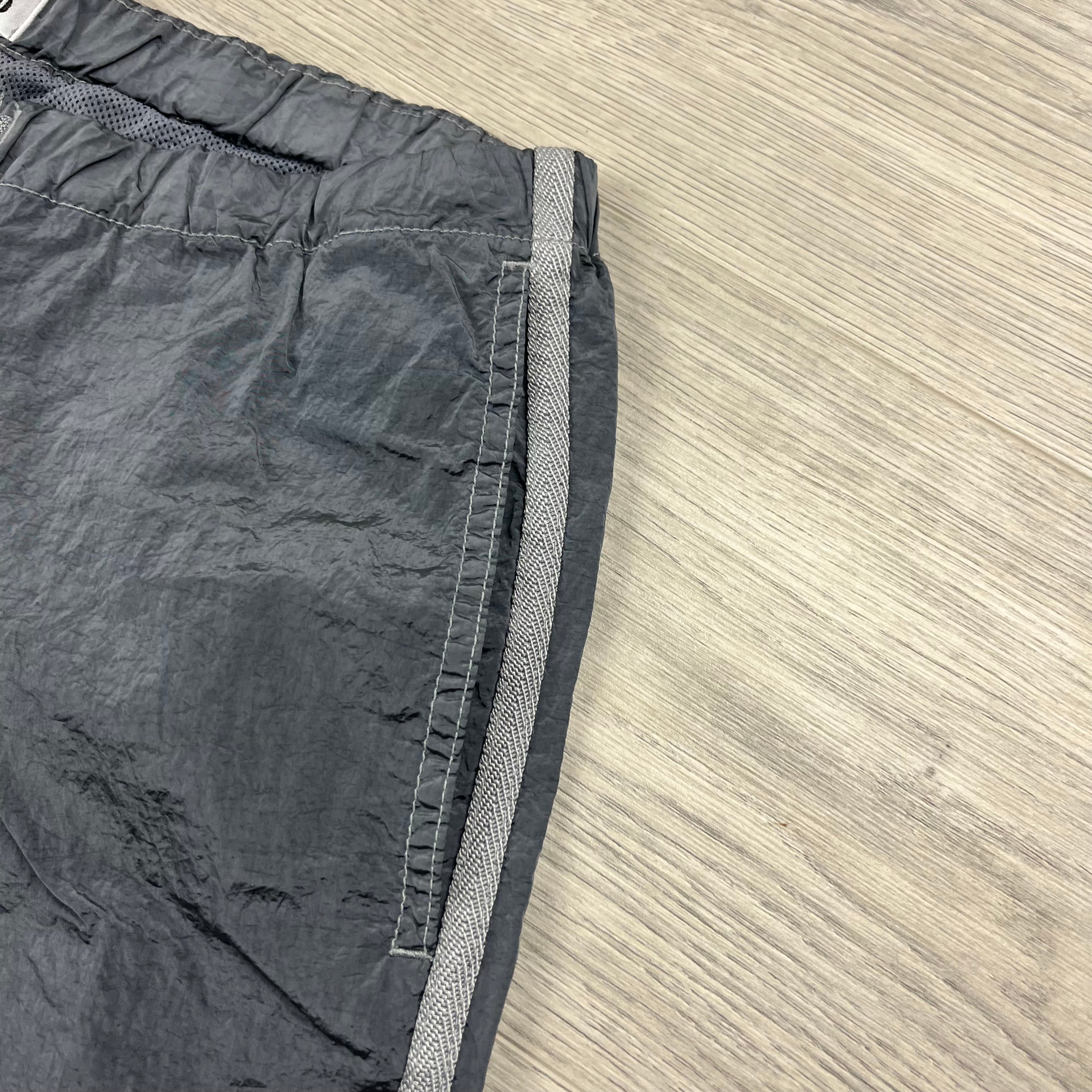 Stone Island Nylon Metal Swim Shorts in Avio Blue. On sale at Open Attire.