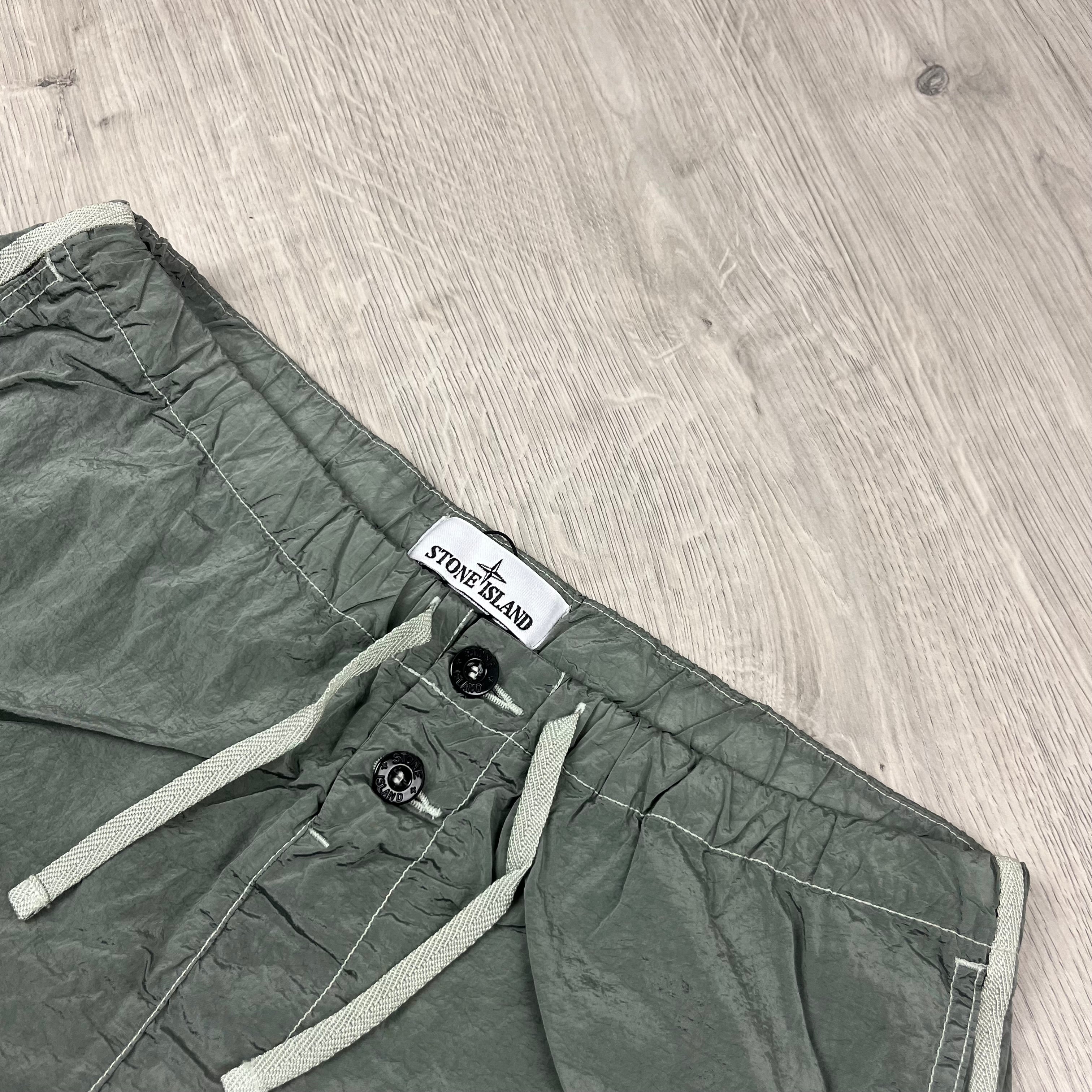 Stone Island Nylon Metal Swim Shorts in Sage Green. On sale at Open Attire.