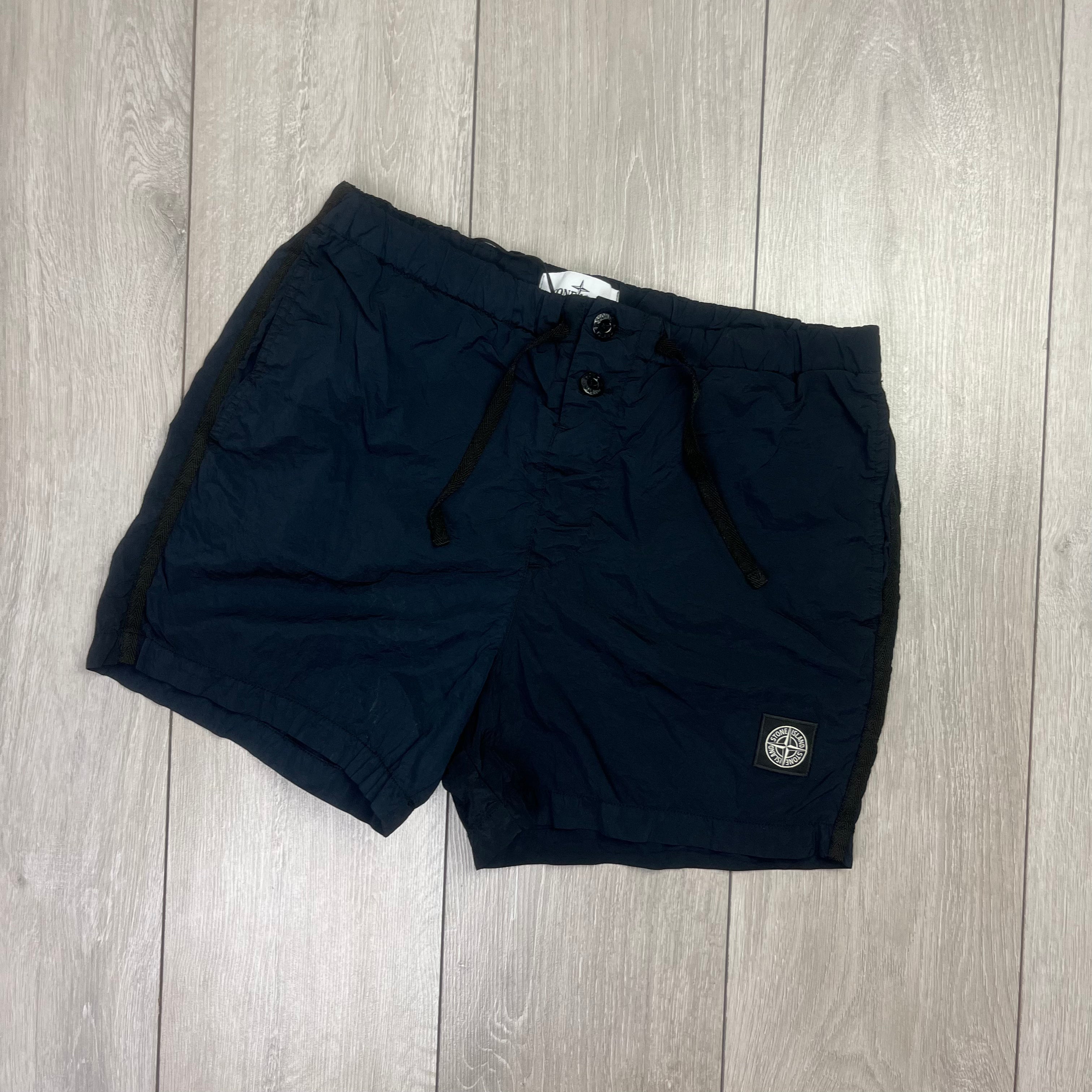 Stone Island Nylon Metal Swim Shorts in Navy Blue. On sale at Open Attire.