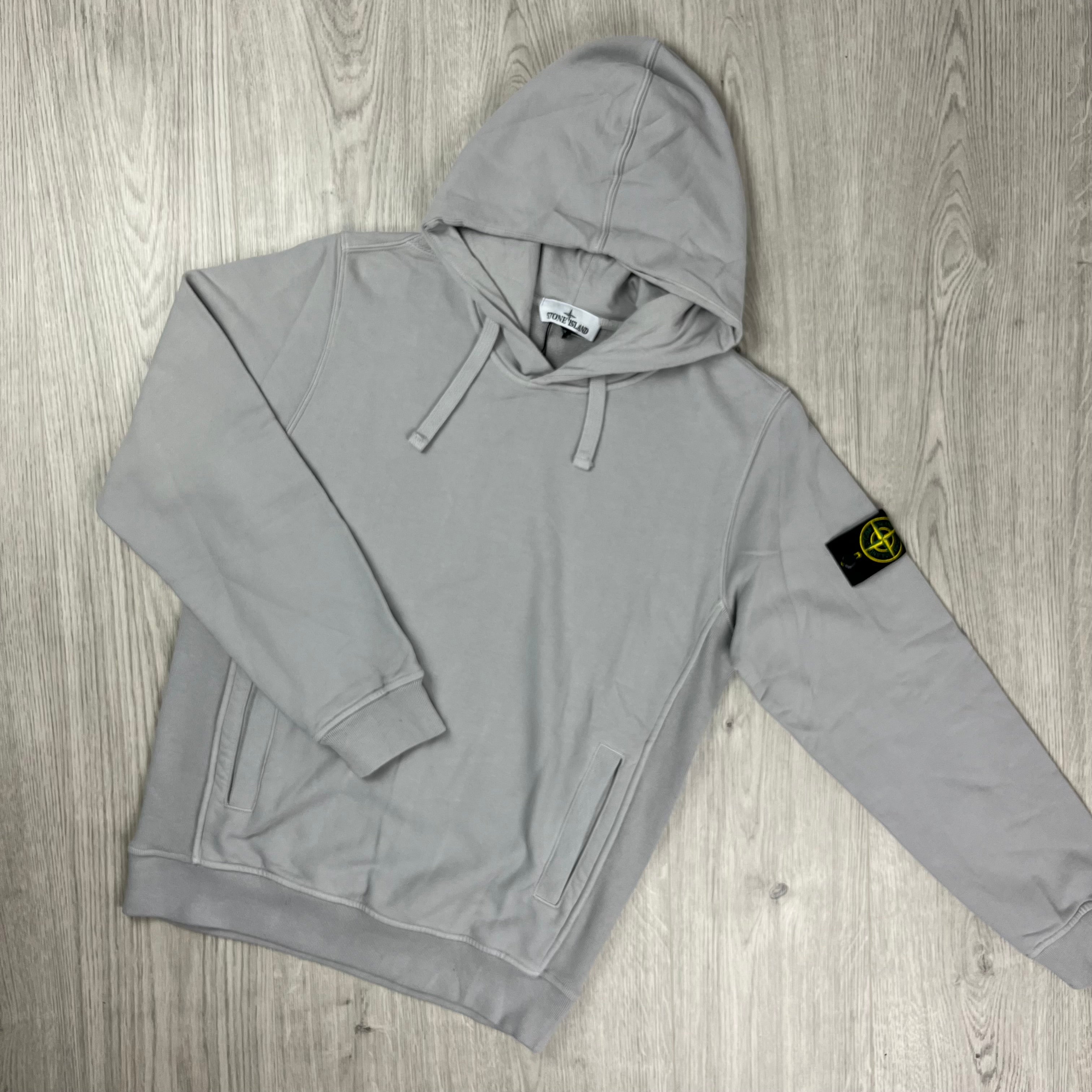 Stone Island hoodie in Grey. On sale at Open Attire.