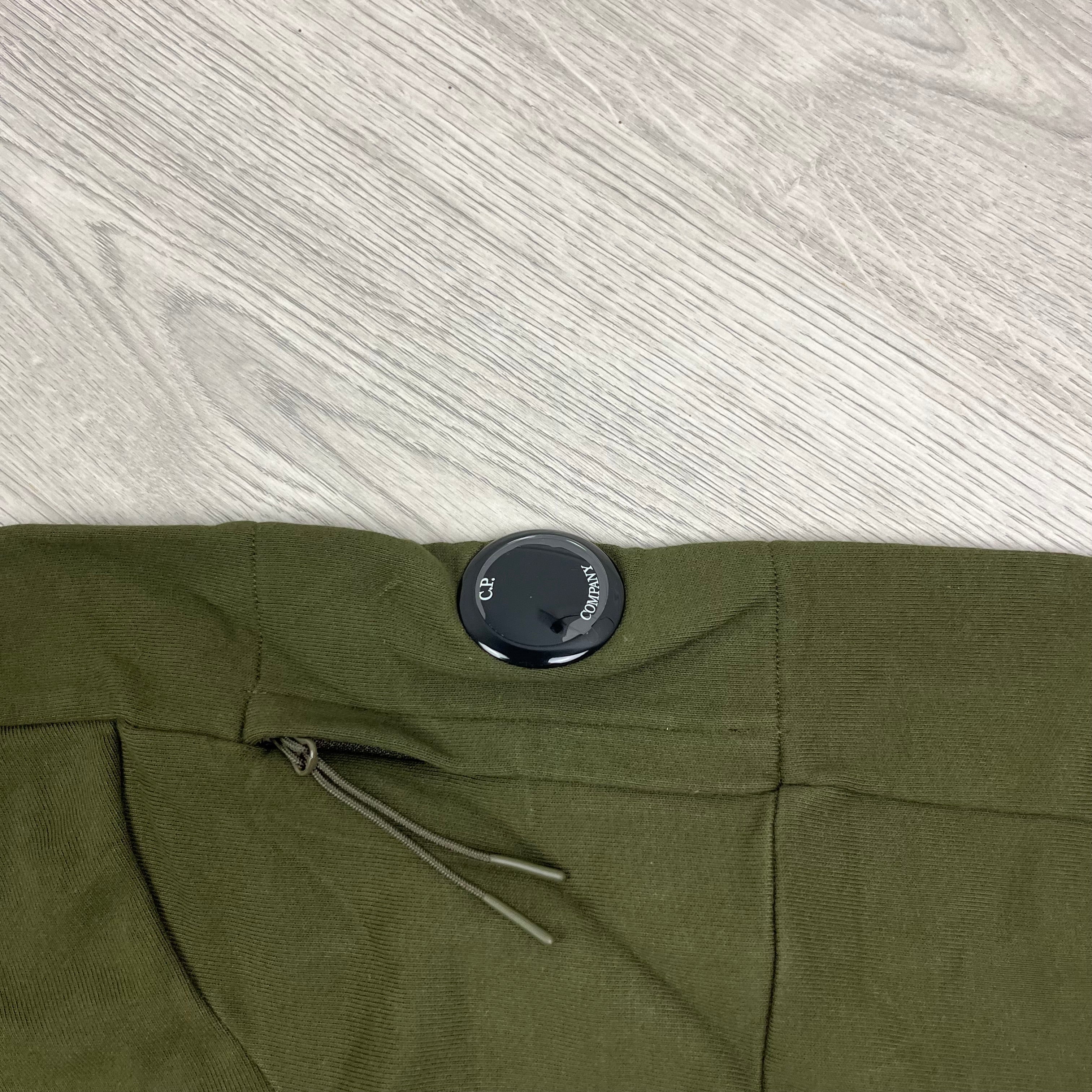 CP Company Diagonal Raised Fleece Zipped Hoodie with sleeve lens detail in Ivy Green. On Sale at Open Attire.