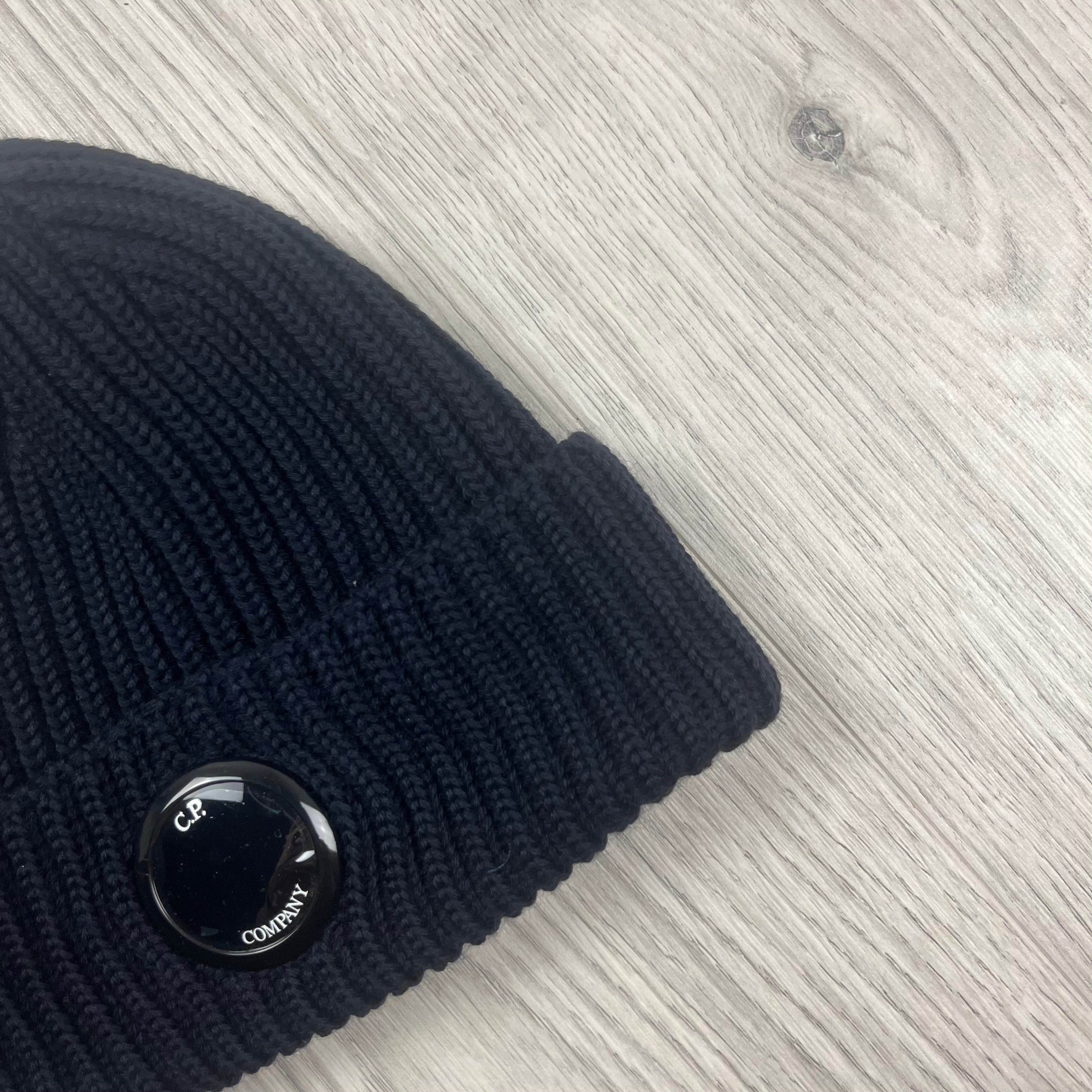 CP Company Merino Wool Lens Beanie in Total Eclipse Navy Blue. On sale at Open Attire.