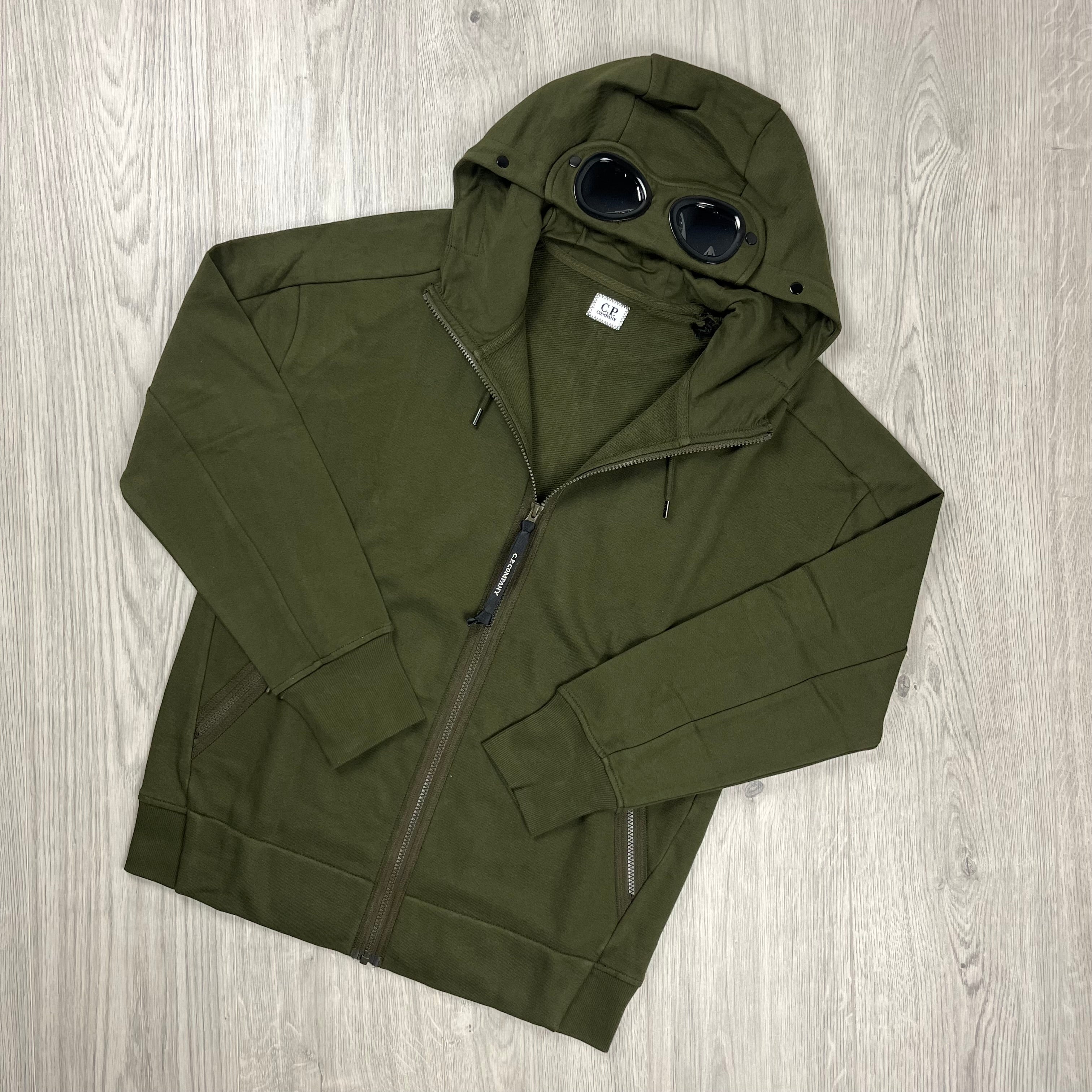 CP Company Raised Fleece Goggle Hoodie in Ivy Green. On sale at Open Attire. 