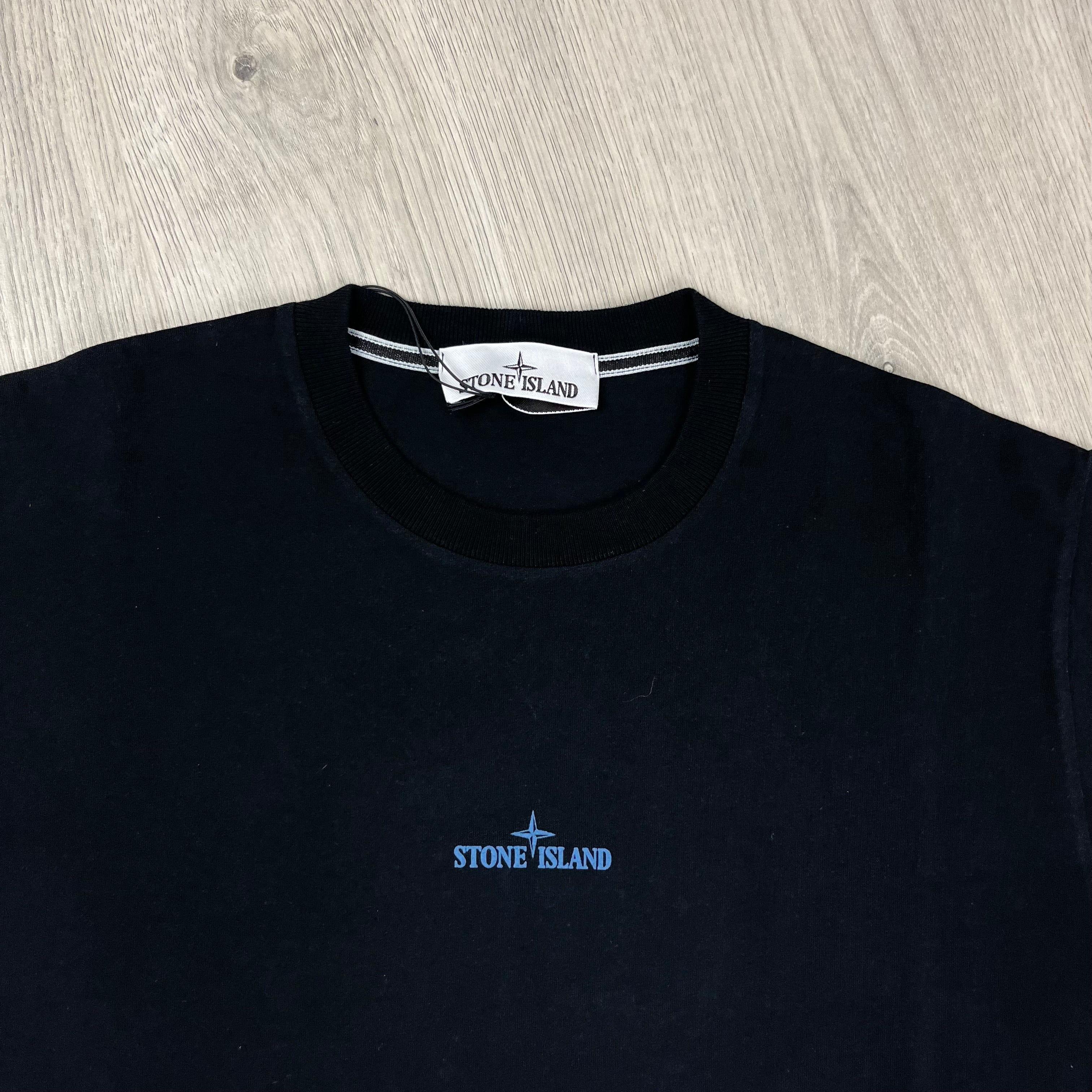 Stone Island 'Institutional Four' T-shirt in Black. On sale at Open Attire.