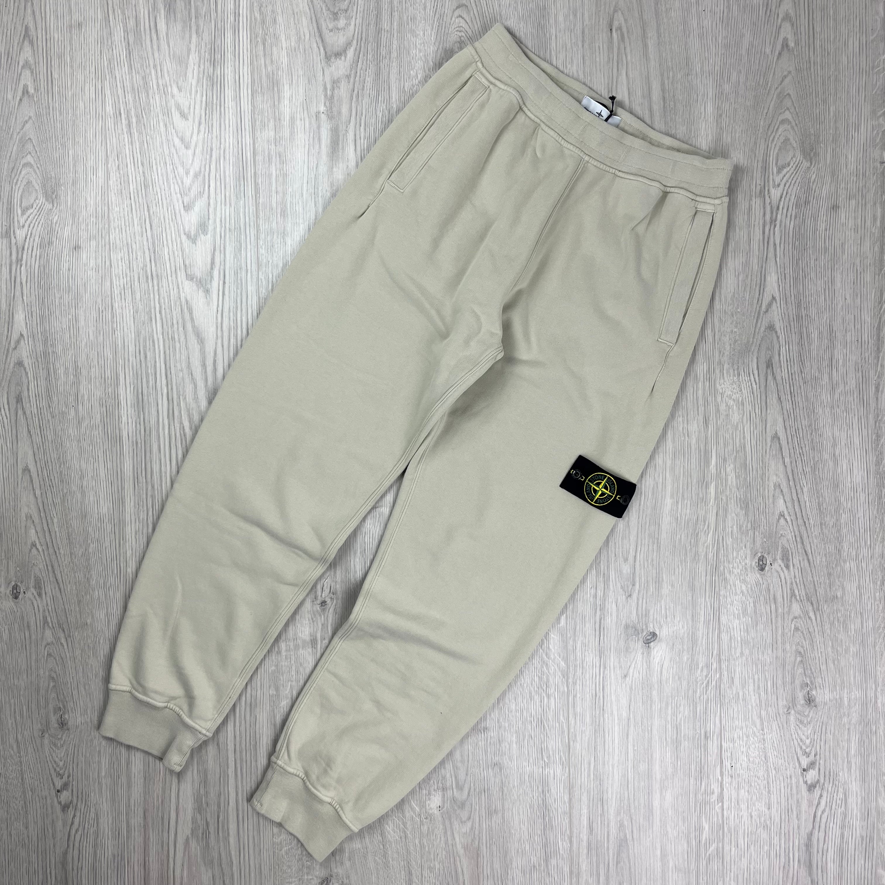 Stone Island Sweatpants in Plaster Beige. On sale at Open Attire.