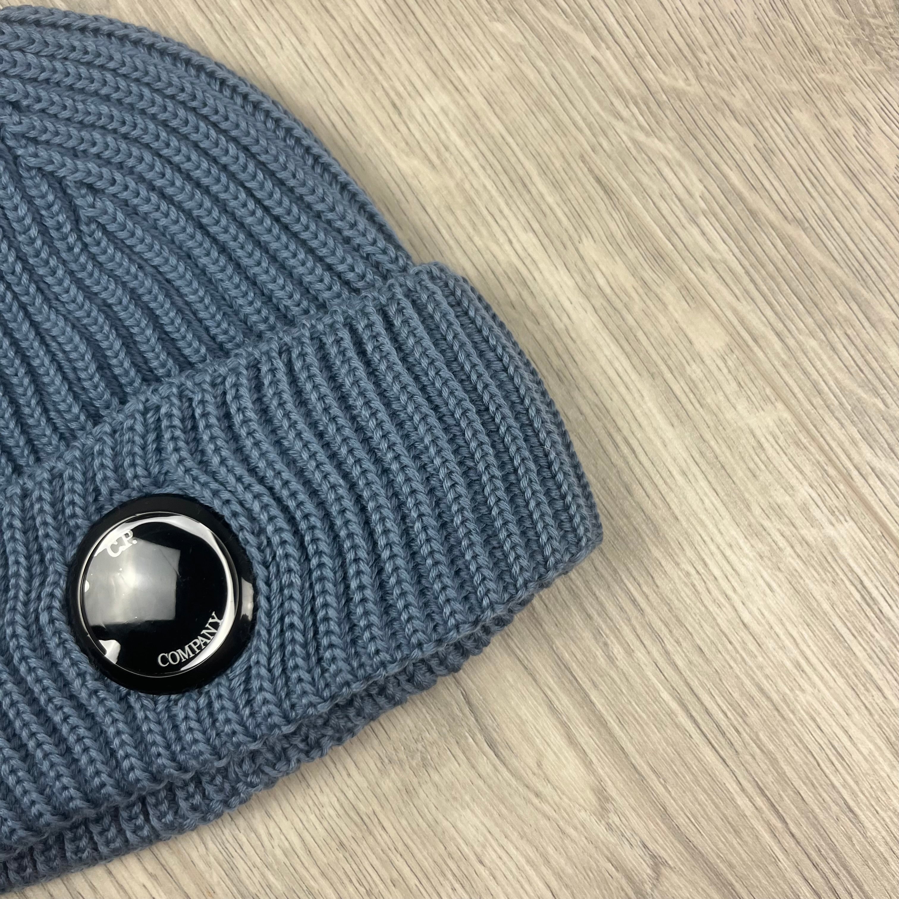 CP Company Merino Wool Lens Beanie in Flint Stone Blue. On sale at Open Attire.