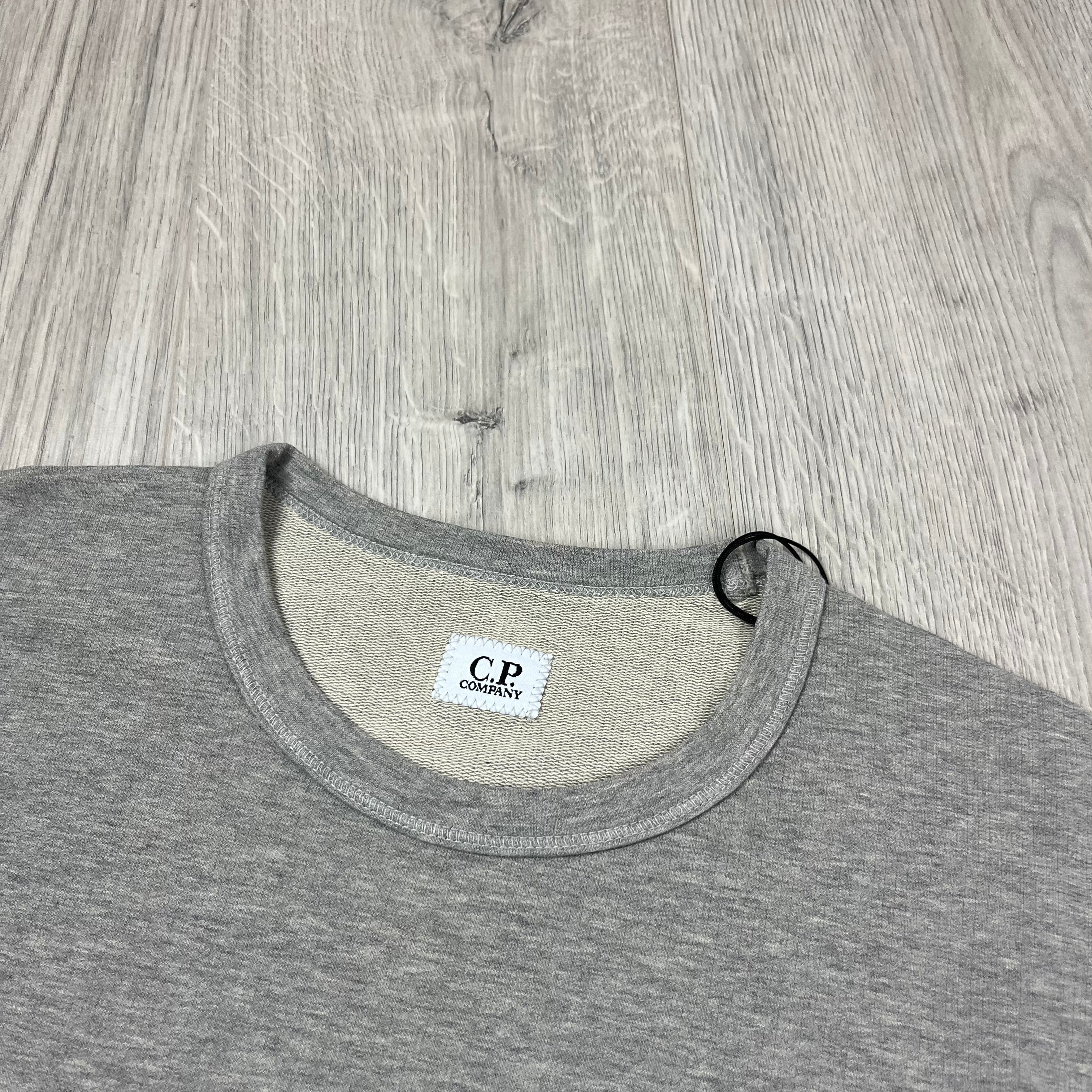 CP Company Light Fleece Sweatshirt in Greystone Melange. On sale at Open Attire.