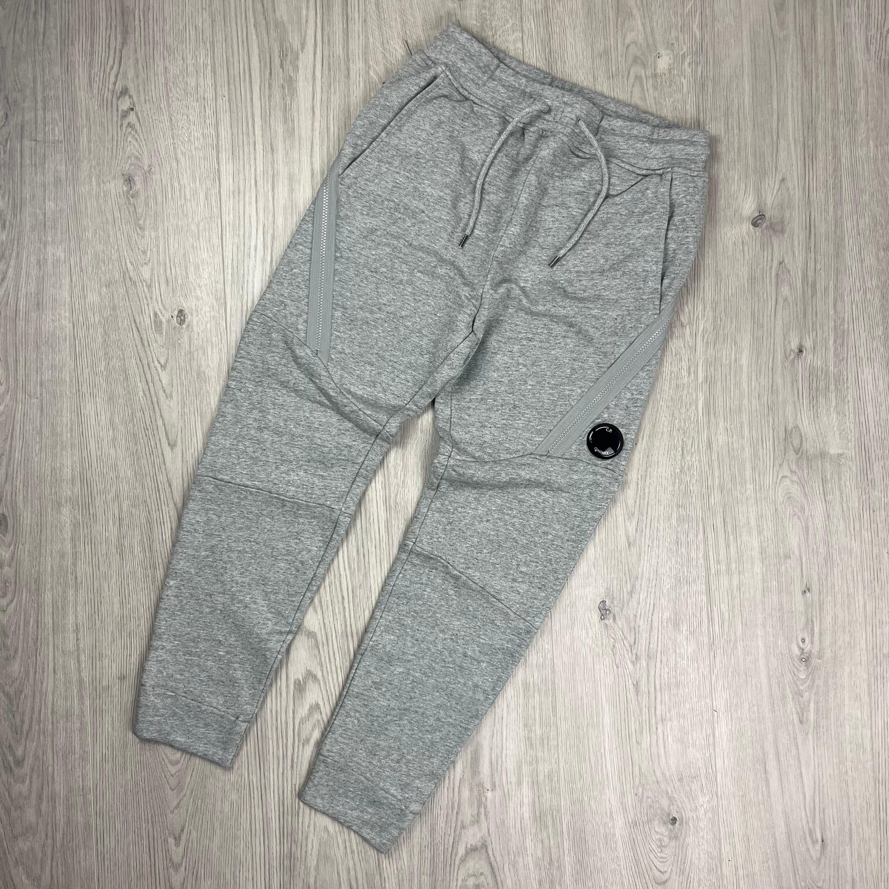 CP Company Tracksuit in Greystone Melange. On sale at Open Attire.