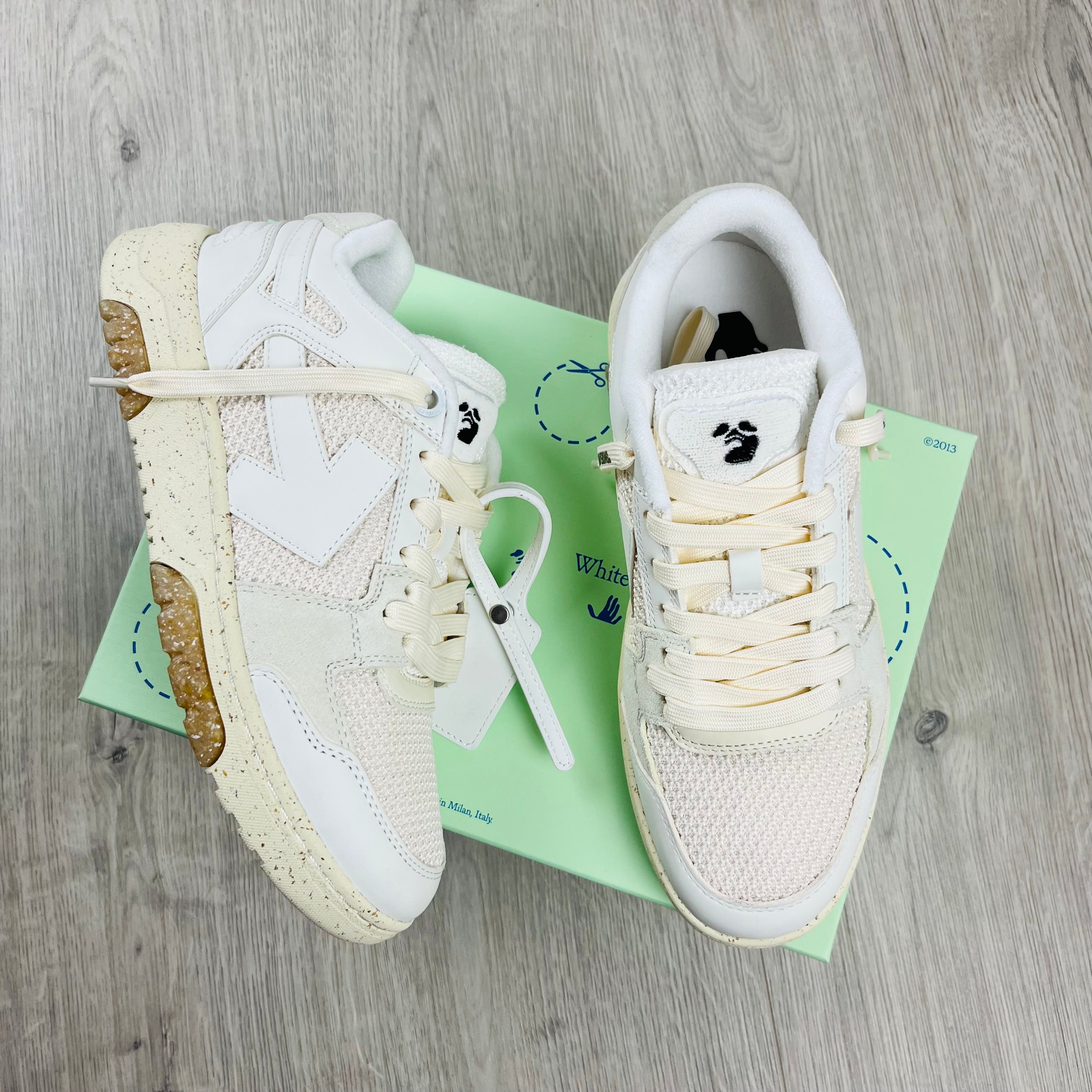 Off-White c/o Virgil Abloh Slim Out Of Office Sneakers in White. On sale at Open Attire.