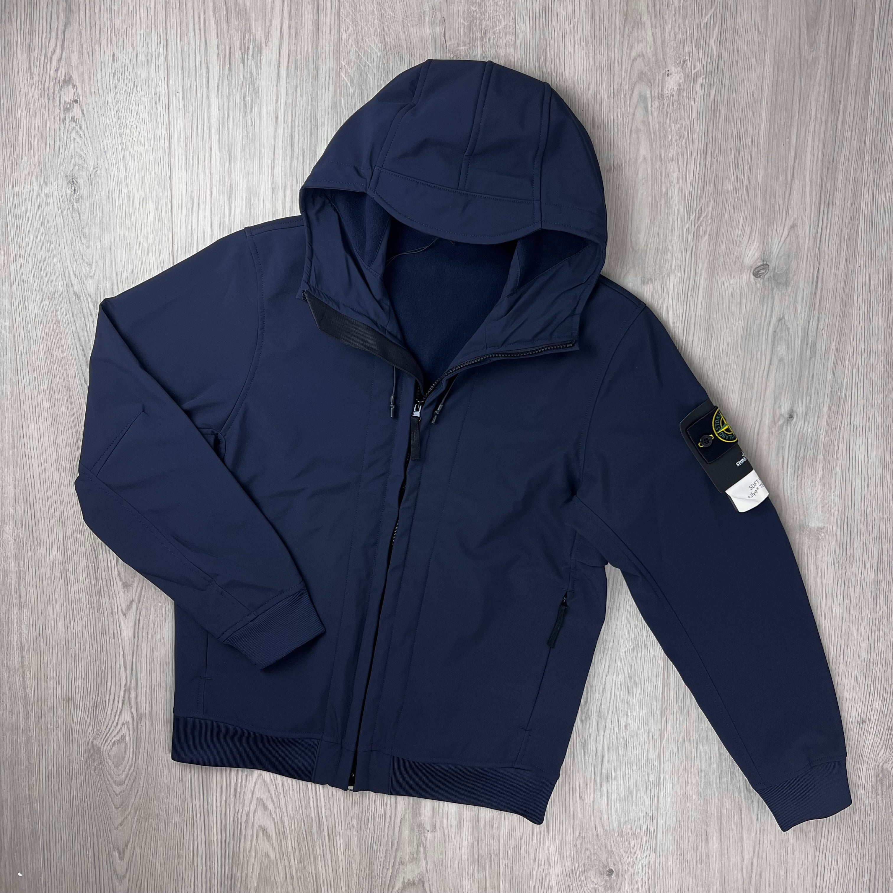 Front view of the Stone Island Soft Shell-R_e.dye® Jacket in Navy Blue.